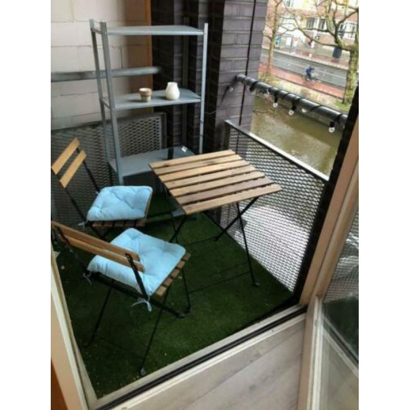 Outdoor Furniture - Table and two chairs with cushions