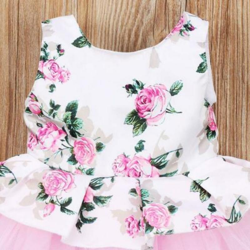 Baby jurk met rozen en tule in roze maat 74/80