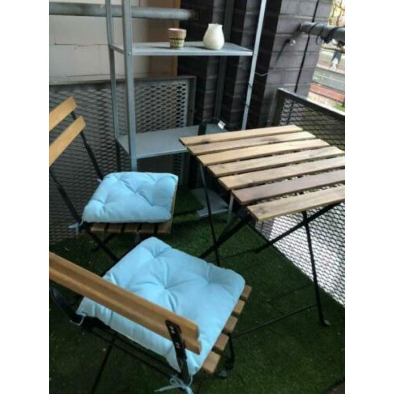 Outdoor Furniture - Table and two chairs with cushions