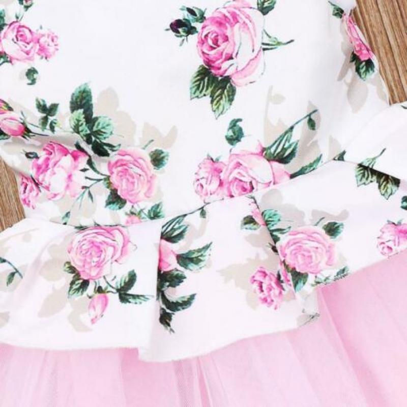 Baby jurk met rozen en tule in roze maat 74/80