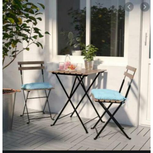 Outdoor Furniture - Table and two chairs with cushions
