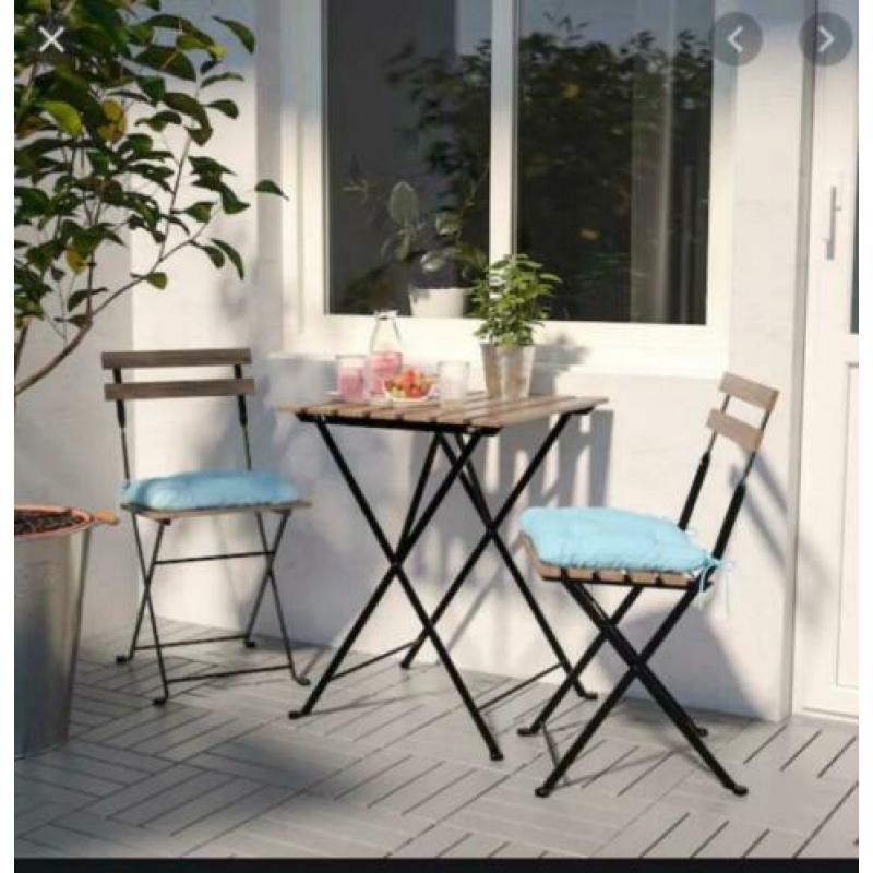 Outdoor Furniture - Table and two chairs with cushions