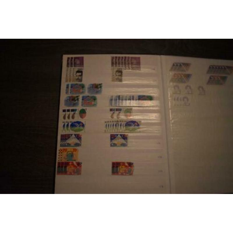 2) stockboek postzegels nederland postfris en gestempeld