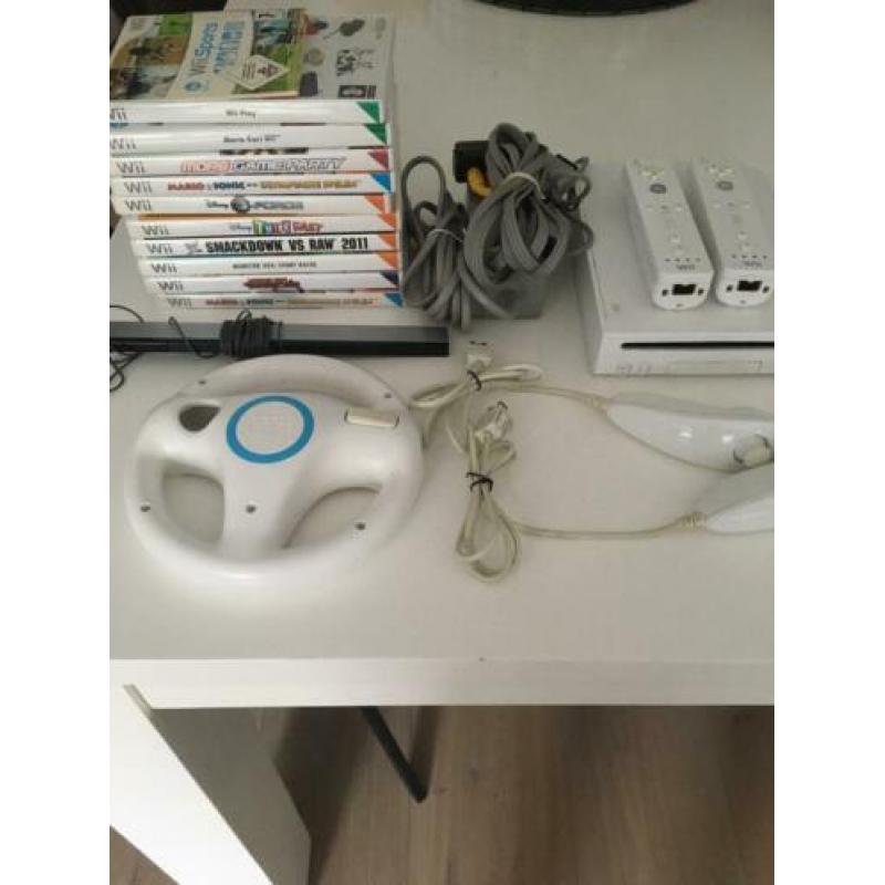 Te koop Nintendo wij met 11 spellen en toebehoren