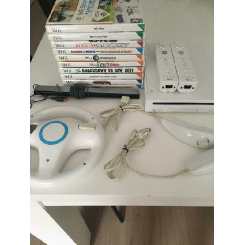 Te koop Nintendo wij met 11 spellen en toebehoren