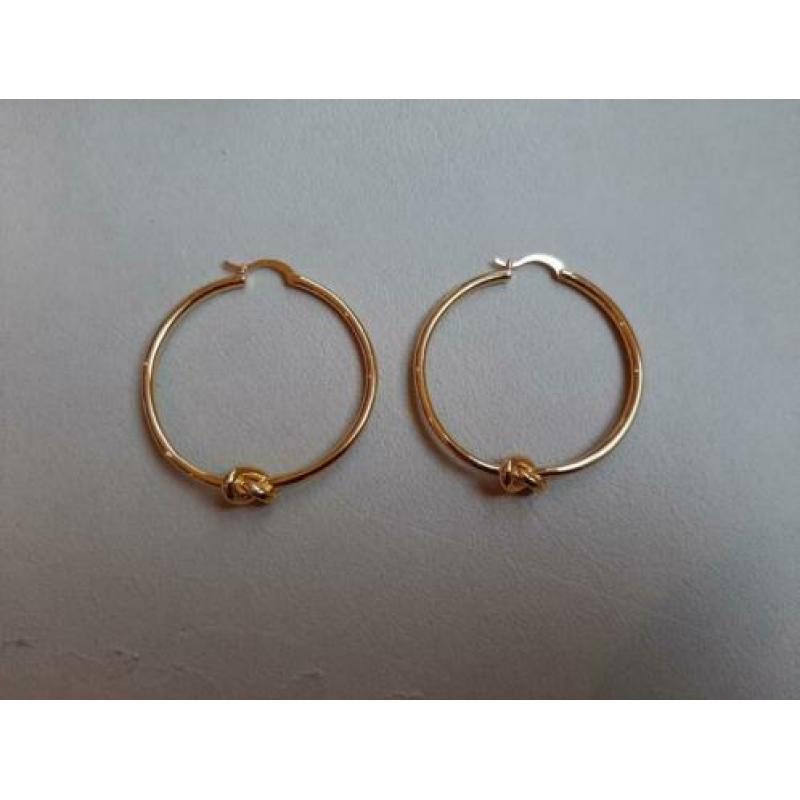 Celine oorbellen knot hoops creolen.