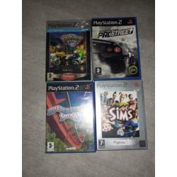 Playstation 2 + 2 controllers + memorycard + 4 games