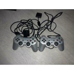 Playstation 2 + 2 controllers + memorycard + 4 games