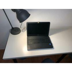 Wit Ikea bureau met open kastje. 60x200x74