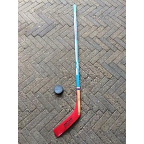 ijshockeystick met puck