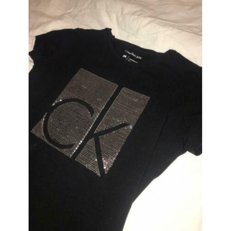 Designer T-shirts & truien
