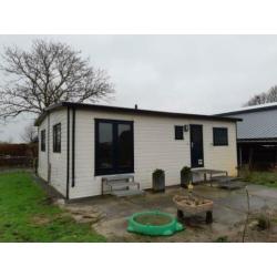 Chalet 7x9m kunststof