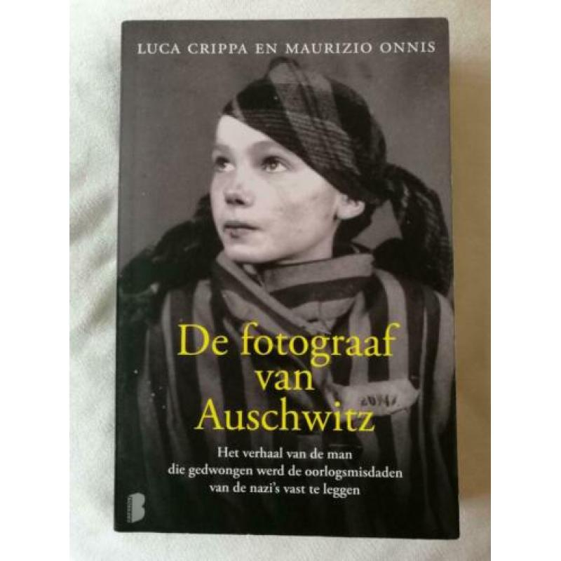 Oorlogsroman "De fotograaf van Auschwitz". In prima staat.