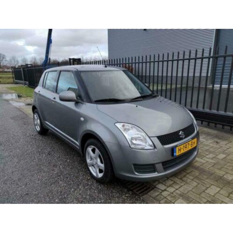 Suzuki Swift 1.3 Comfort , 86125 km, AIRCO, CV met afst bed.