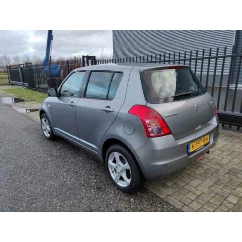 Suzuki Swift 1.3 Comfort , 86125 km, AIRCO, CV met afst bed.
