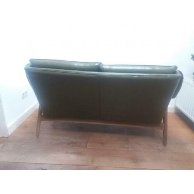 Retro vintage groene bank