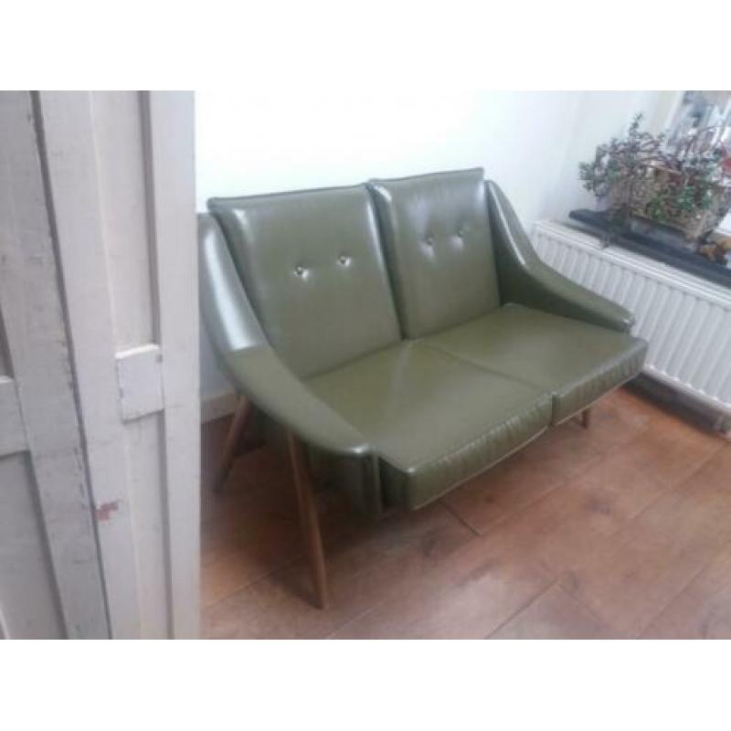 Retro vintage groene bank