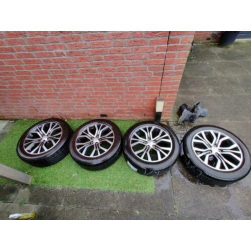 4x Mitsubishi Outlander lichtmetalen velgen 18 inch met band