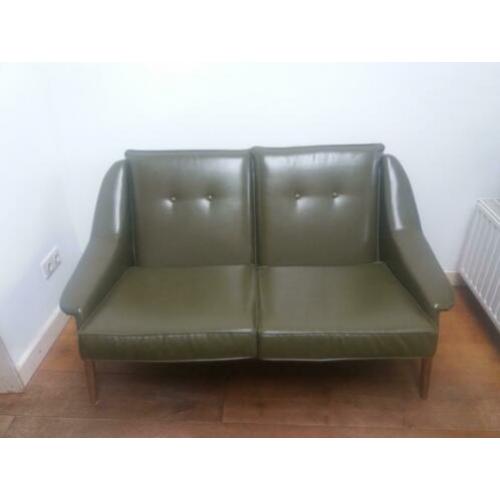 Retro vintage groene bank