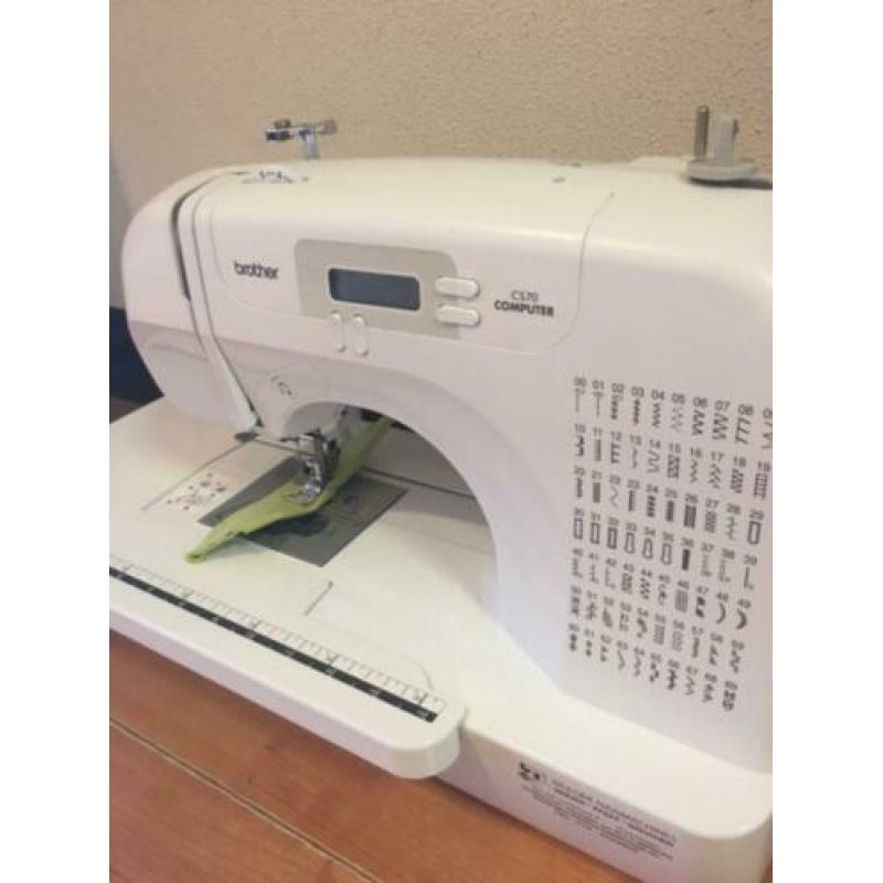 Brother COMPUTERNAAIMACHINE MET VERLENGTAFEL MODEL ce70