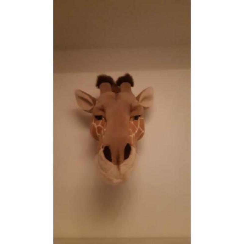 Giraffe dierenkop voor aan de muur