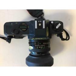 Nieuwstaat Canon T50 met Tokina 70-210 mm lens, flitser, tas