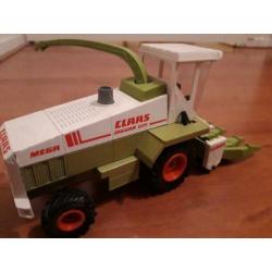 Claas jaguar 695 maishakselaar van Siku