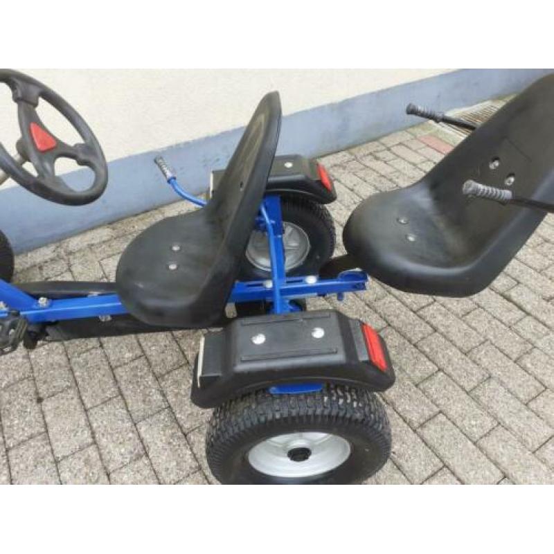 Nette robuste skelter met duo zit en vrijloop