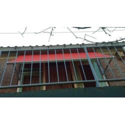 Electrisch zonnescherm