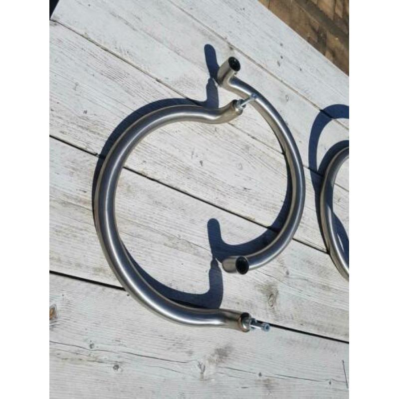 Drie maal duwstang 42 cm hoog en 24 cm breed